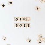 girl boss text on brown background