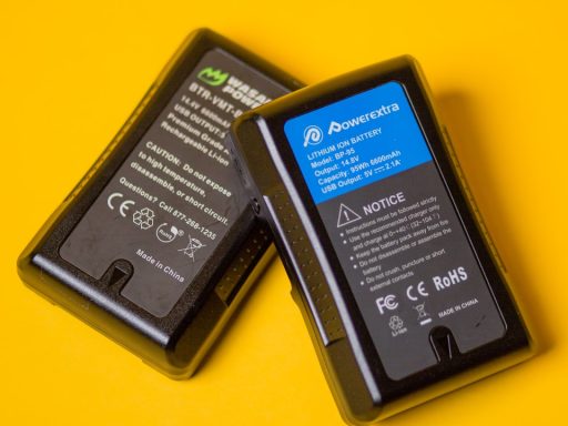 black samsung galaxy smartphone on yellow table