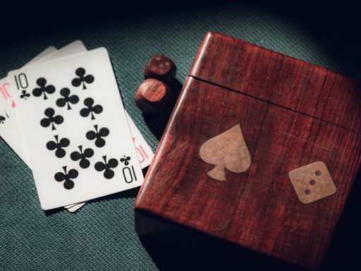 playing cards and dice on a table