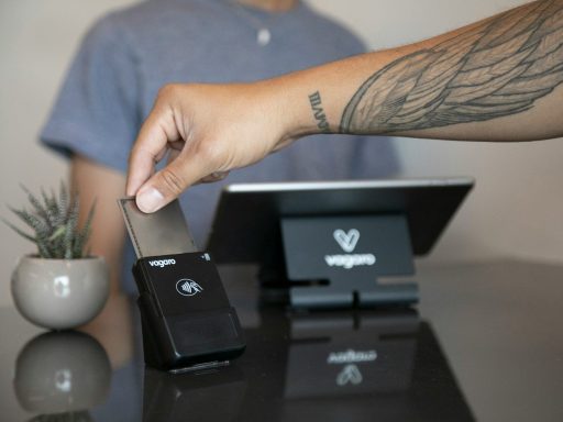 a person holding a device in their hand