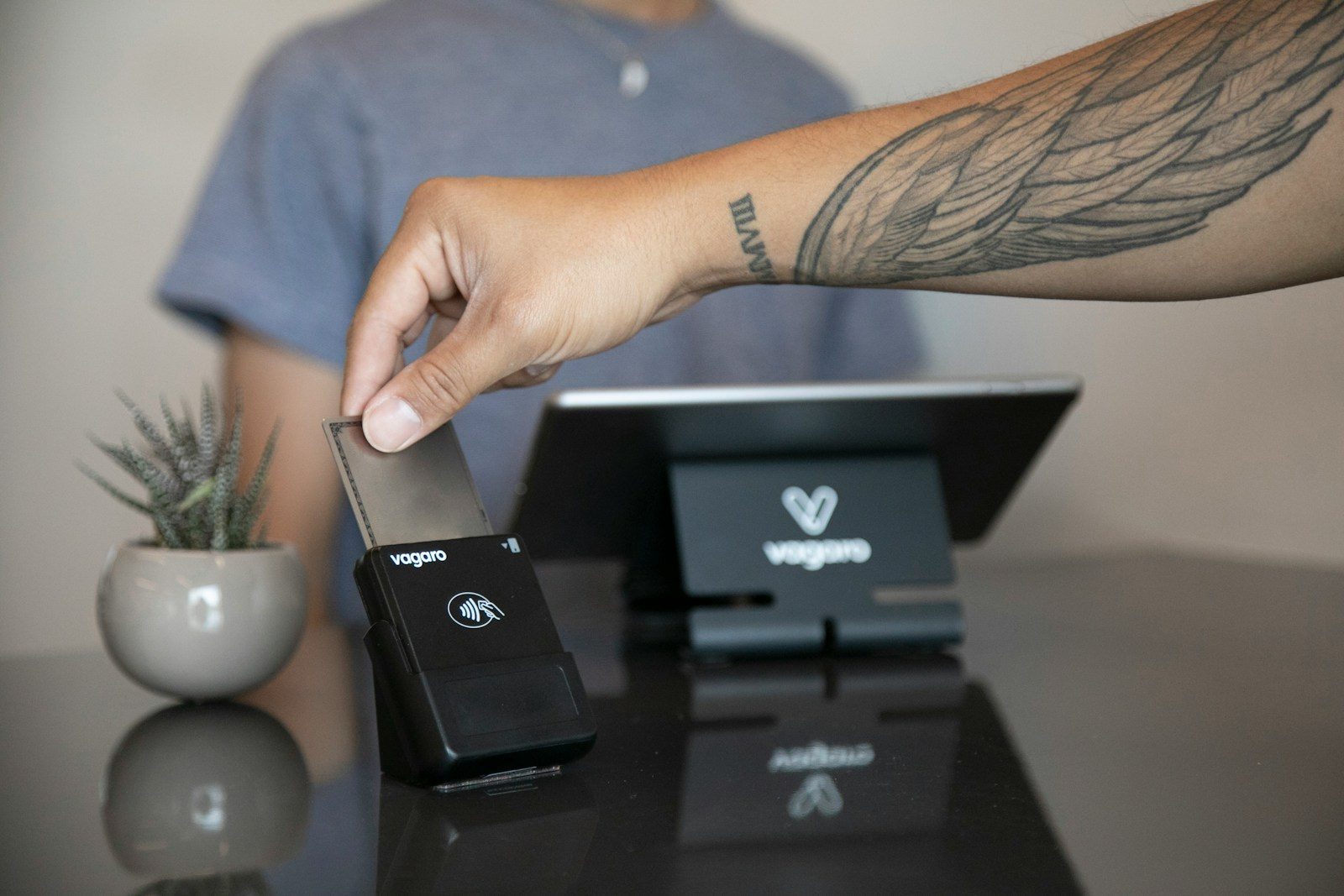 a person holding a device in their hand